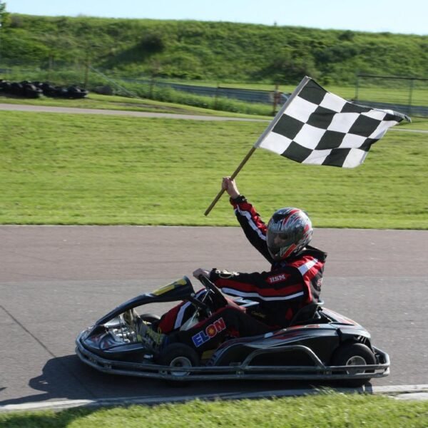 Driver-Waving-the-Checkered-Flag-after-Win-the-Race